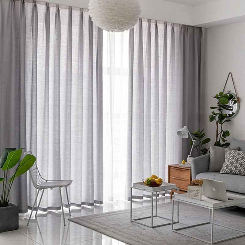 grey sheer curtain in apartment